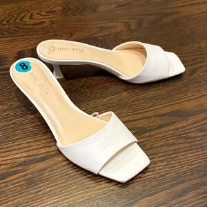 Nine West Women's Cream Heeled Mules